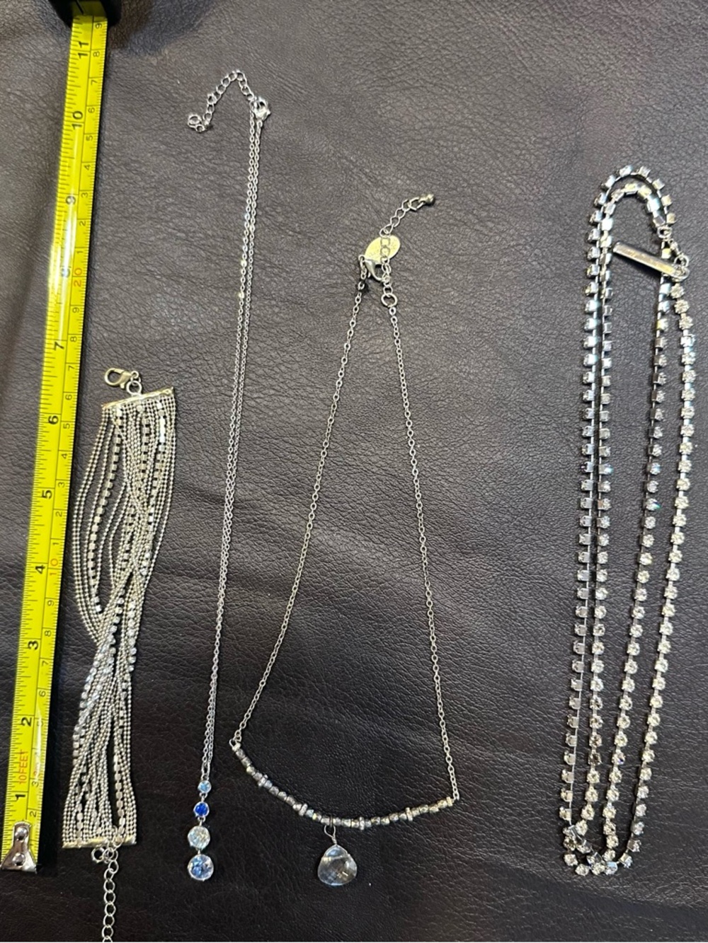 3 silver bling  necklaces and bracelet